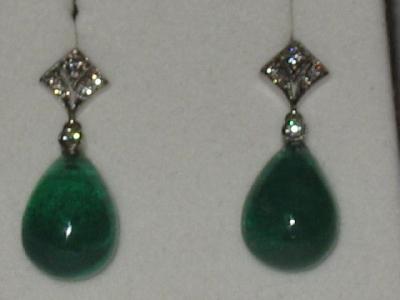 Appraisal: A PAIR OF EMERALD AND DIAMOND EARRINGS the pear shaped