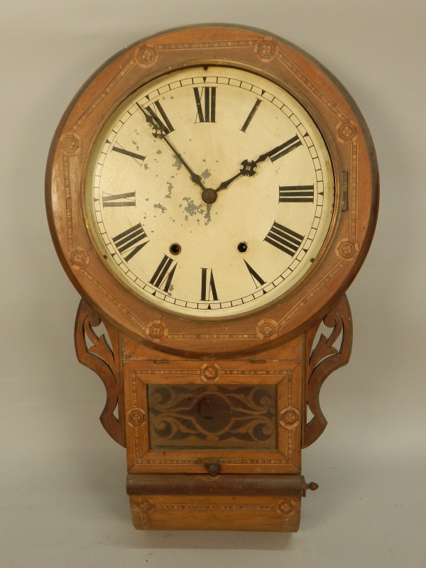 Appraisal: A thC walnut and marquetry drop dial clock with a