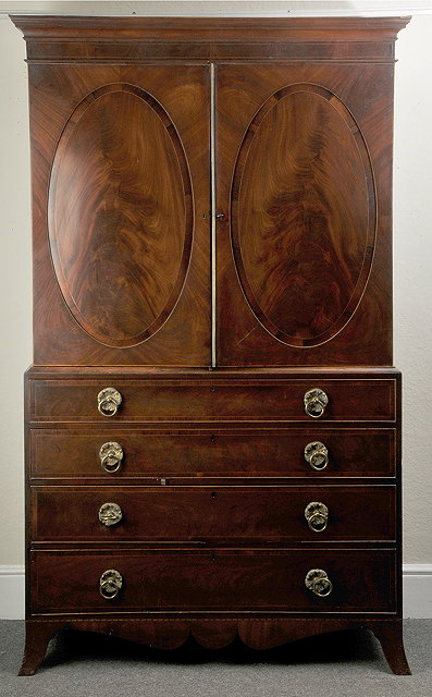 Appraisal: A GEORGE III MAHOGANY AND SATINWOOD INLAID LINEN PRESS with