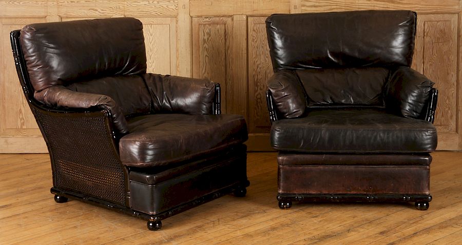 Appraisal: PAIR LEATHER UPHOLSTERED ARM CHAIRS CANED BACK A pair of