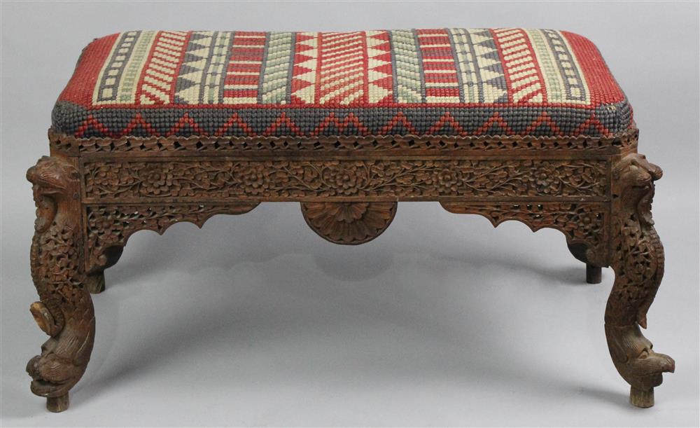 Appraisal: BURMESE CARVED FIGURAL TEAK WINDOW BENCH th Century upholstered in