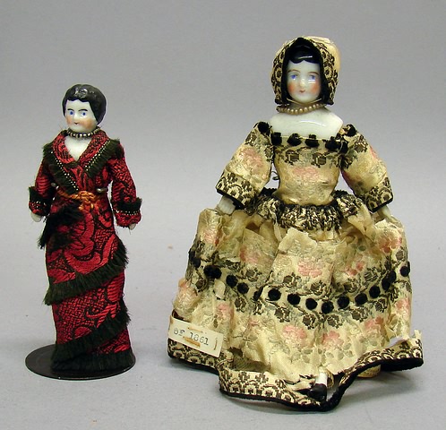 Appraisal: Pair of small German china Lowbrow dolls with black hair