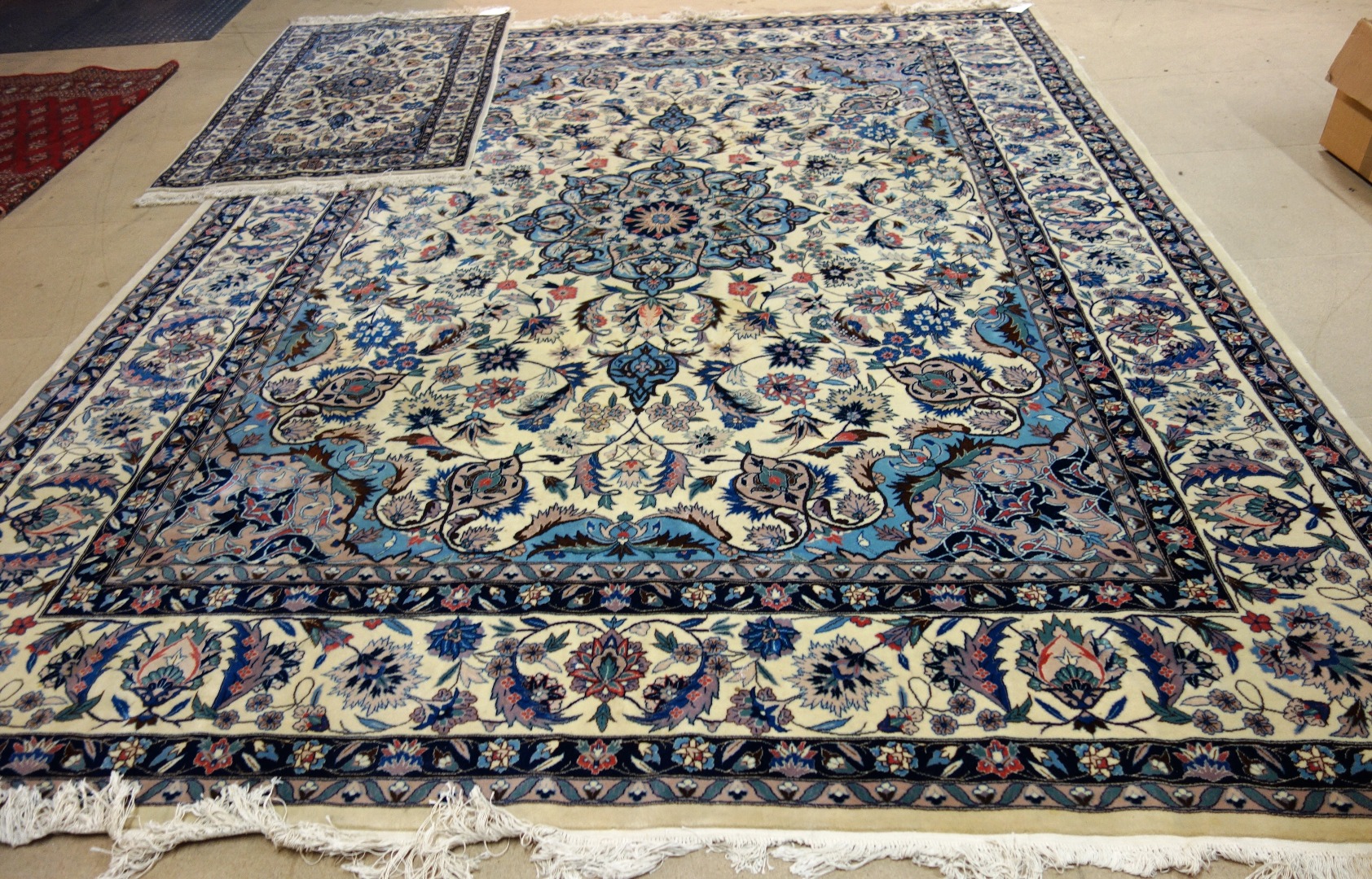 Appraisal: A modern Turkish Duruder carpet the ivory field with an