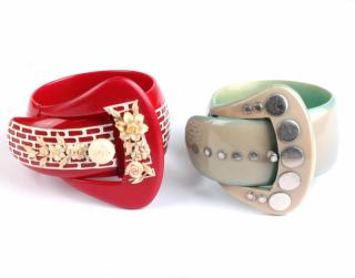 Appraisal: 's Celluloid Buckle Cuff Bracelets Two 's celluloid buckle cuff