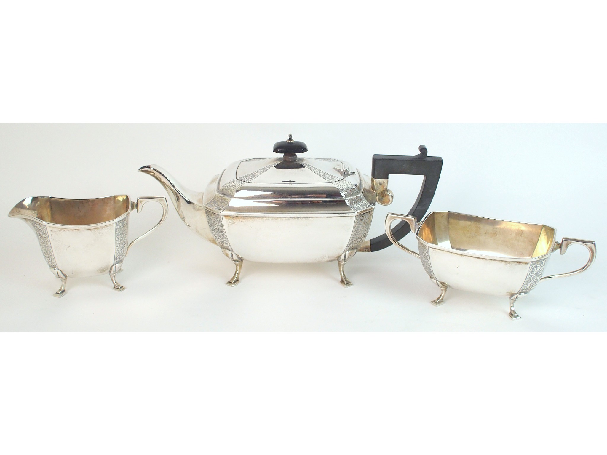 Appraisal: A three piece silver tea servicemaker's marks J C Limited