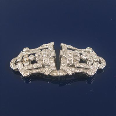 Appraisal: A pair of Art Deco diamond clip brooches the open