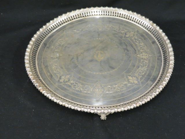 Appraisal: Fine Silverplate Round Serving Tray footed fancy openwork engraved designs