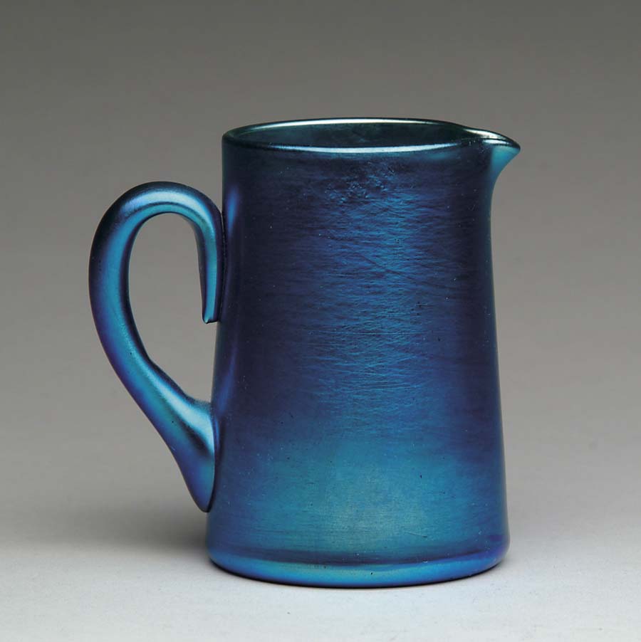 Appraisal: TIFFANY CREAMER Lovely blue favrile creamer has applied handle and