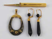 Appraisal: A mixed lot comprising a pair of gold mounted earrings