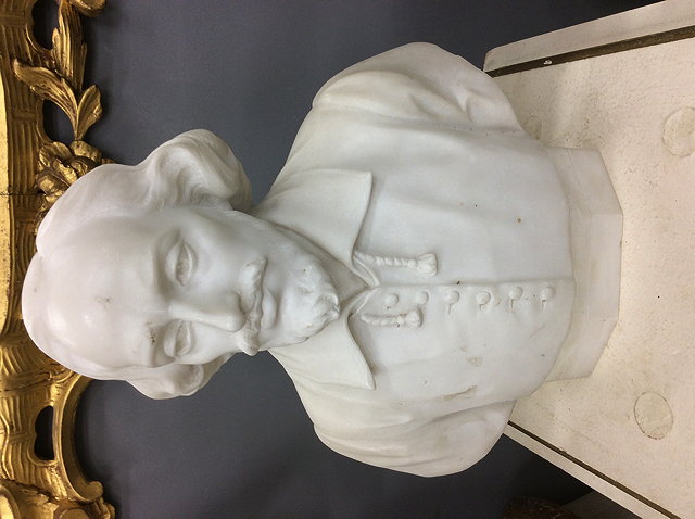 Appraisal: A WHITE MARBLE BUST of a bearded gentleman signed P