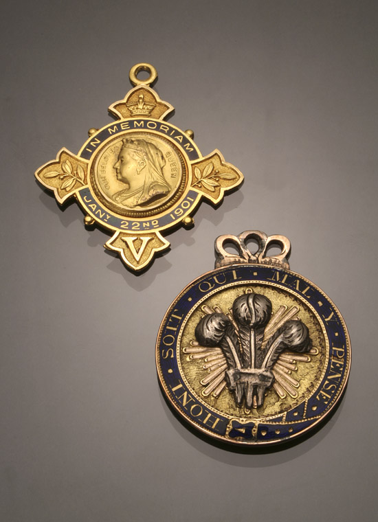 Appraisal: Two British Gold and Enamel Badges The first circa -