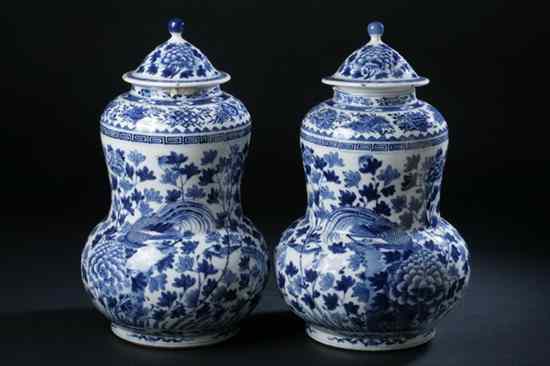 Appraisal: PAIR CHINESE BLUE AND WHITE PORCELAIN JARS AND COVERS Kangxi