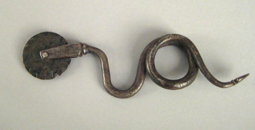 Appraisal: Pennsylvania wrought iron pie crimper early th c with serpent