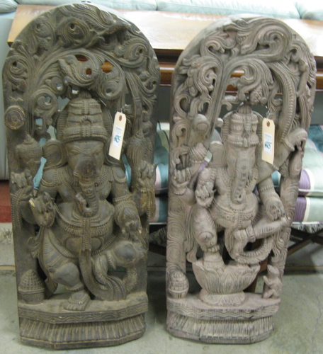 Appraisal: TWO EAST INDIAN WOOD SCULPTURES Ganesha the elephant god the