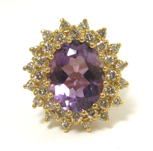 Appraisal: AMETHYST DIAMOND AND FOURTEEN KARAT GOLD RING with round-cut diamonds