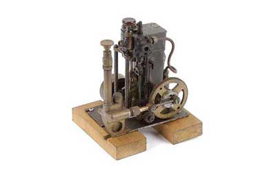 Appraisal: Vertical Steam Engine mounted on a wooden base single cylinder