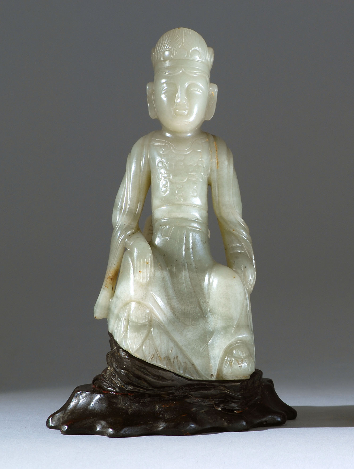 Appraisal: CELADON JADE FIGURE th CenturyDepicting Buddha in seated position Height