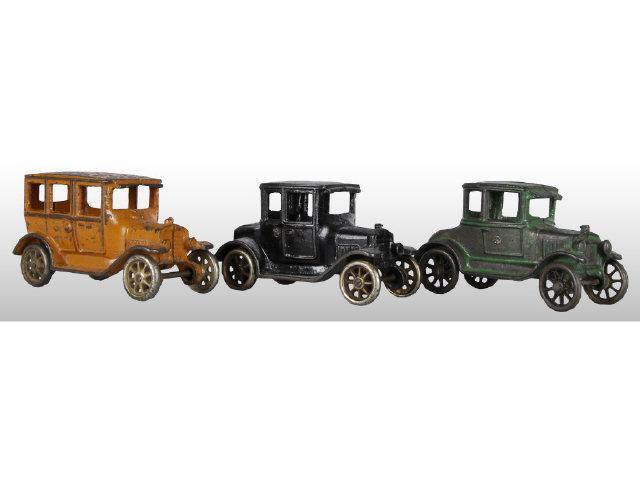 Appraisal: Lot of Cast Iron Automobile Toys Description Two Model T's