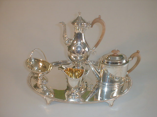 Appraisal: An thC style silver five piece tea service comprising an