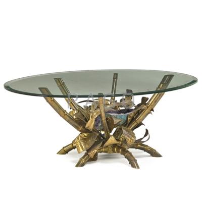 Appraisal: JACQUES DUVAL BRASSEUR Illuminated coffee table France s Patinated brass