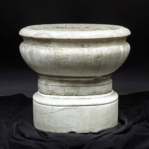 Appraisal: A Baroque carved marble jardini re on an associated plinth