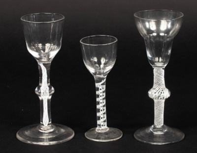 Appraisal: Two th Century wine glasses with single series opaque twist