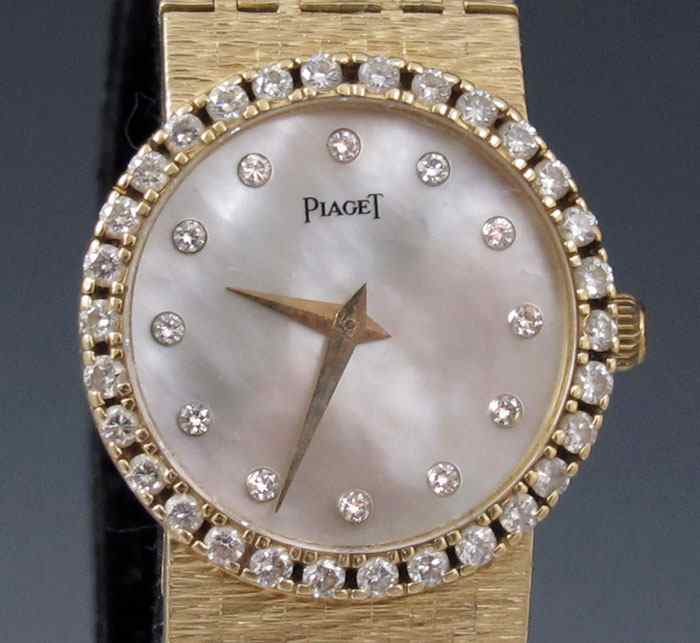 Appraisal: K PIAGET LADIES WRISTWATCH Mother of pearl dial with diamond