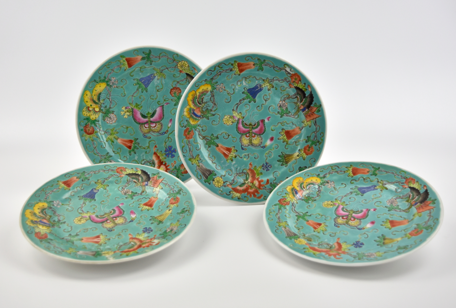 Appraisal: four Chinese ROC period famille rose dish decorated with butterflies