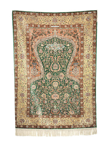 Appraisal: A silk and metal thread Hereke prayer rug West Anatolia