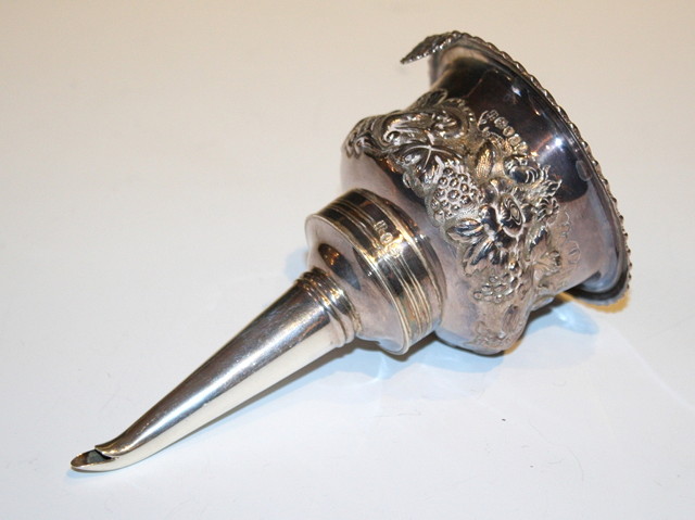 Appraisal: A WILLIAM IV SILVER WINE FUNNEL IN TWO PARTS drilled