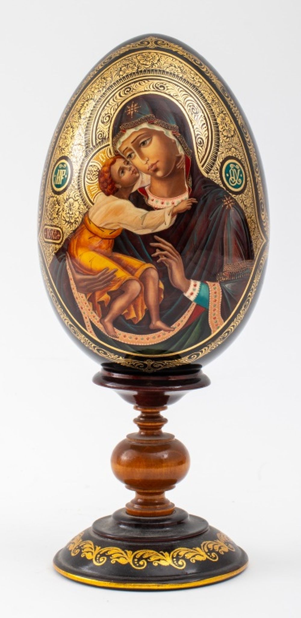 Appraisal: RUSSIAN LACQUER FEODOROVSKAYA ICON EGG ON STAND Russian lacquer icon