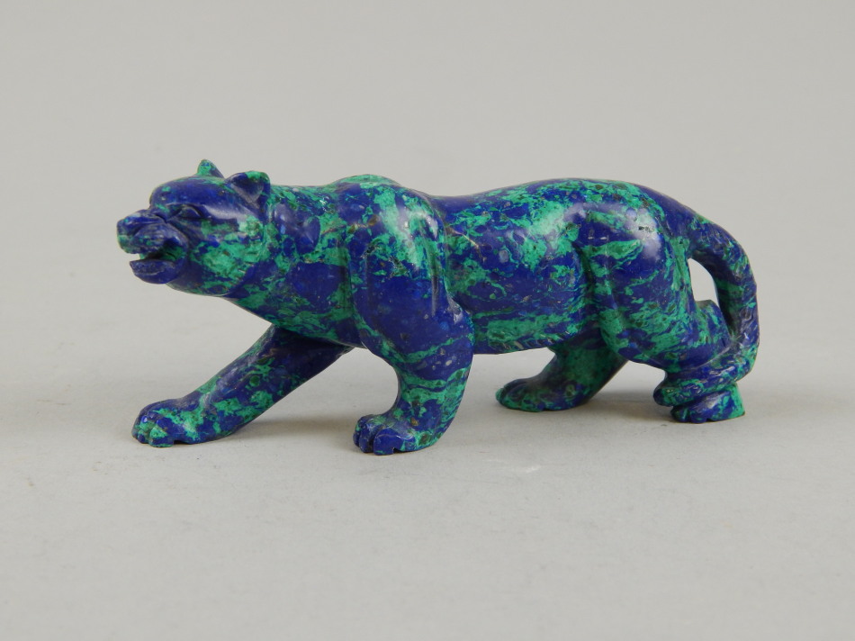 Appraisal: A carved blue green hardstone leopard cm long Provenance Butterfields