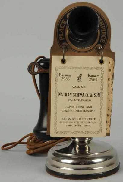 Appraisal: Kellogg Stick Telephone with Hanging Directory Circa nickeled brass with