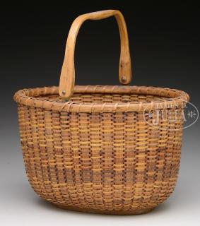 Appraisal: SWING-HANDLED NANTUCKET LIGHT SHIP BASKET BY AD WILLIAMS Oval basket