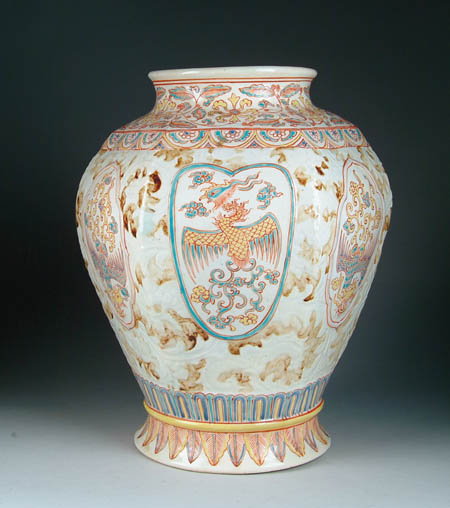 Appraisal: FINE ORIENTAL STYLE PANELED VASE White ground has molded flower