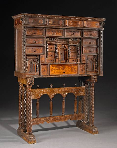 Appraisal: A South German Northern Italian Baroque marquetry and walnut cabinet