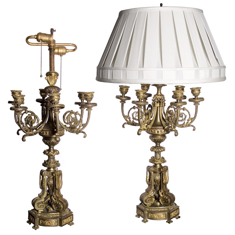 Appraisal: Pair of Louis XVI Style Gilt-Bronze Seven-Light Candelabra Each mounted