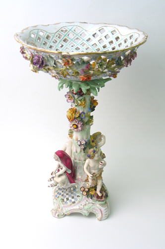 Appraisal: GERMAN DRESDEN PORCELAIN FIGURAL COMPOTE The base having four cherub-like