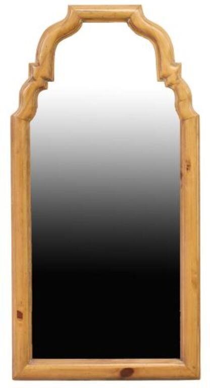 Appraisal: Carved wood wall mirror having shaped and molded frame encasing