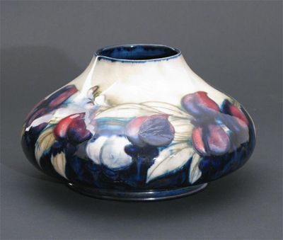 Appraisal: Wisteria' A Moorcroft Pottery vase designed by William Moorcroft painted