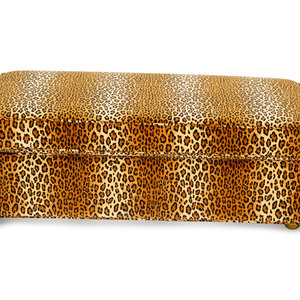 Appraisal: A Carlye Cheetah Print Upholstered Convertible Ottoman th Century opening