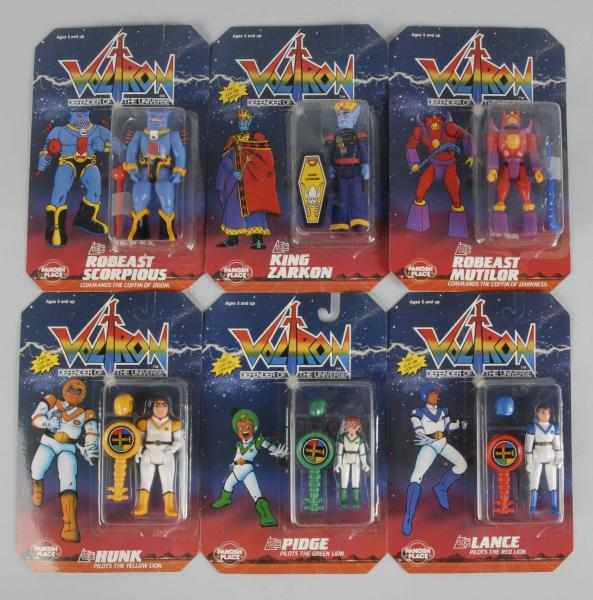 Appraisal: Lot of Panosh Voltron Action Figures Description Marked World Events