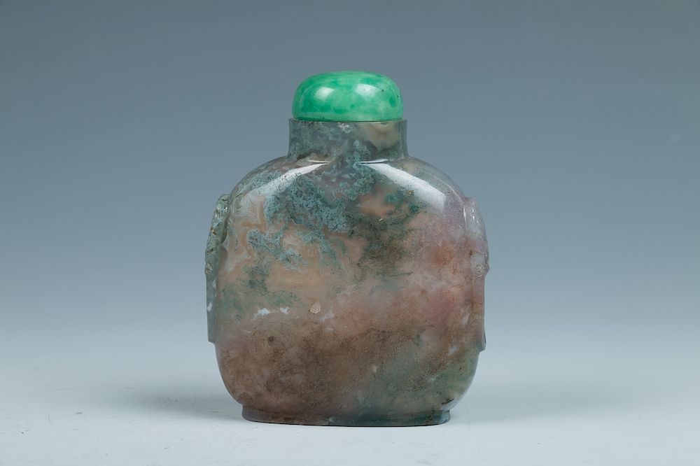 Appraisal: AGATE SNUFF BOTTLE Of compressed rectangular form with beast mask