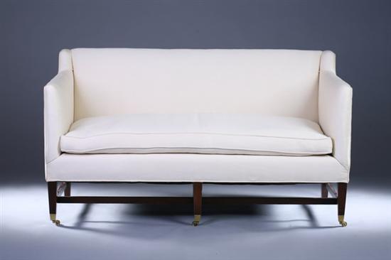 Appraisal: CONTEMPORARY NEOCLASSICAL STYLE MAHOGANY LOVE SEAT th century with ribbed