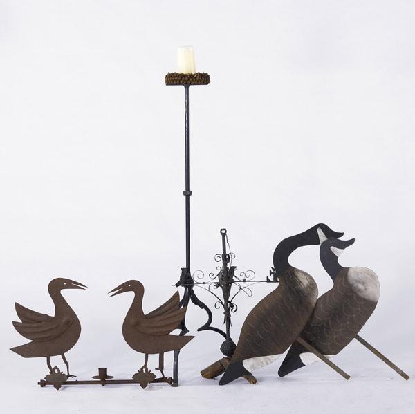 Appraisal: WROUGHT IRON ACCESSORIES Torchere bird directional and geese lawn ornaments