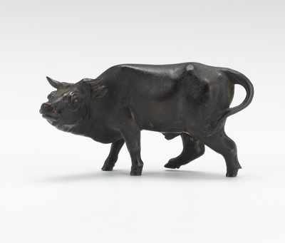 Appraisal: A Miniature Bronze Figure of a Bull Cast bronze with