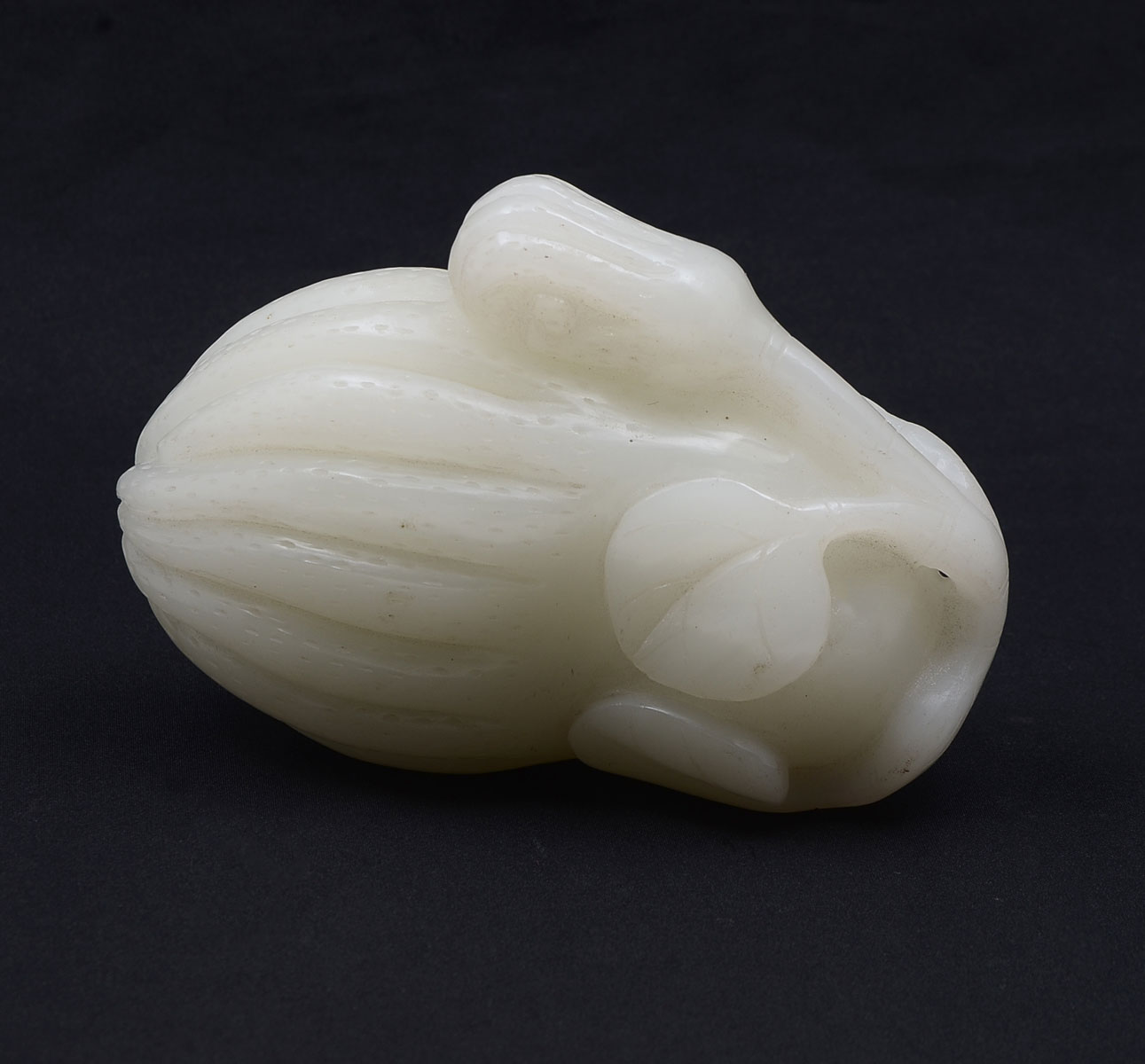 Appraisal: CHINESE WHITE JADE FRUIT CARVING Carved white jade Buddha's hand