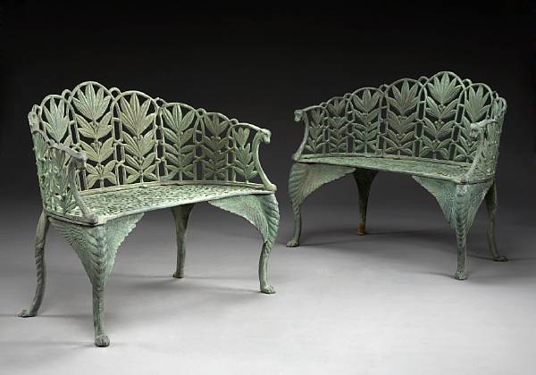 Appraisal: A pair of Victorian style painted iron benches Each arched