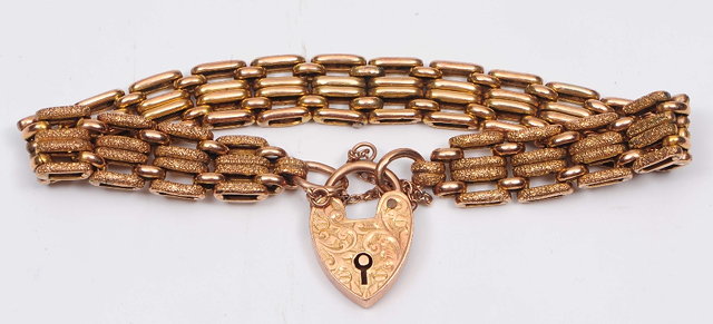 Appraisal: A ct gold gatelink braceletwith padlock clasp grams