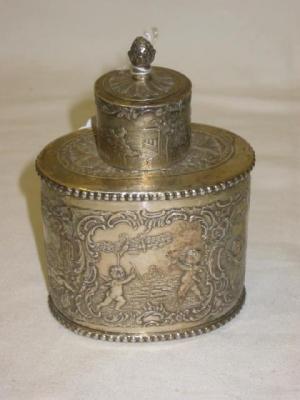 Appraisal: A CONTINENTAL TEA CADDY of oval form with pineapple finial